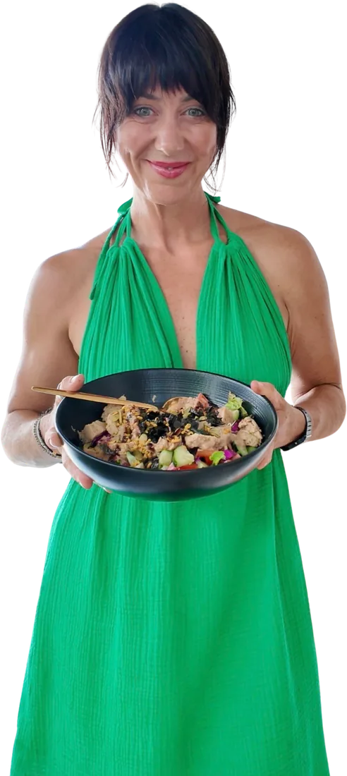 Vicki Jones holding a plant-based bowl